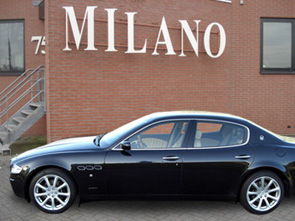 Een prachtige Maserati Quattroporte met beige lederen interieur
