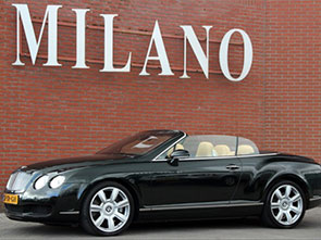 Een prachtige Bentley Continental GTC Cabrio in donkergroen metaal met beige lederen interieur en een werkelijk uniek lage kilometerstand van 9300 km!!!!